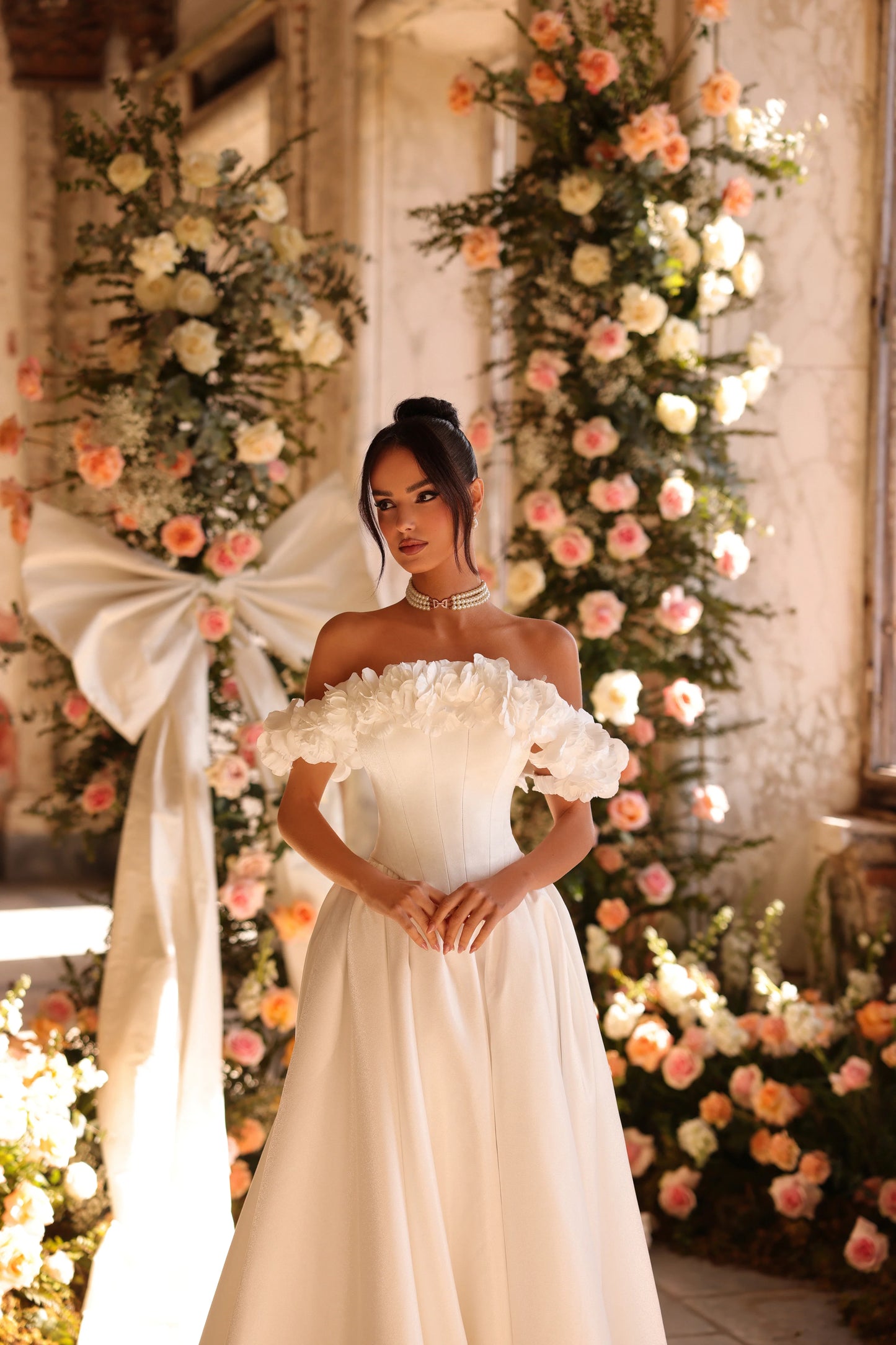 Modern bridal look with structured corset bodice and soft satin texture
