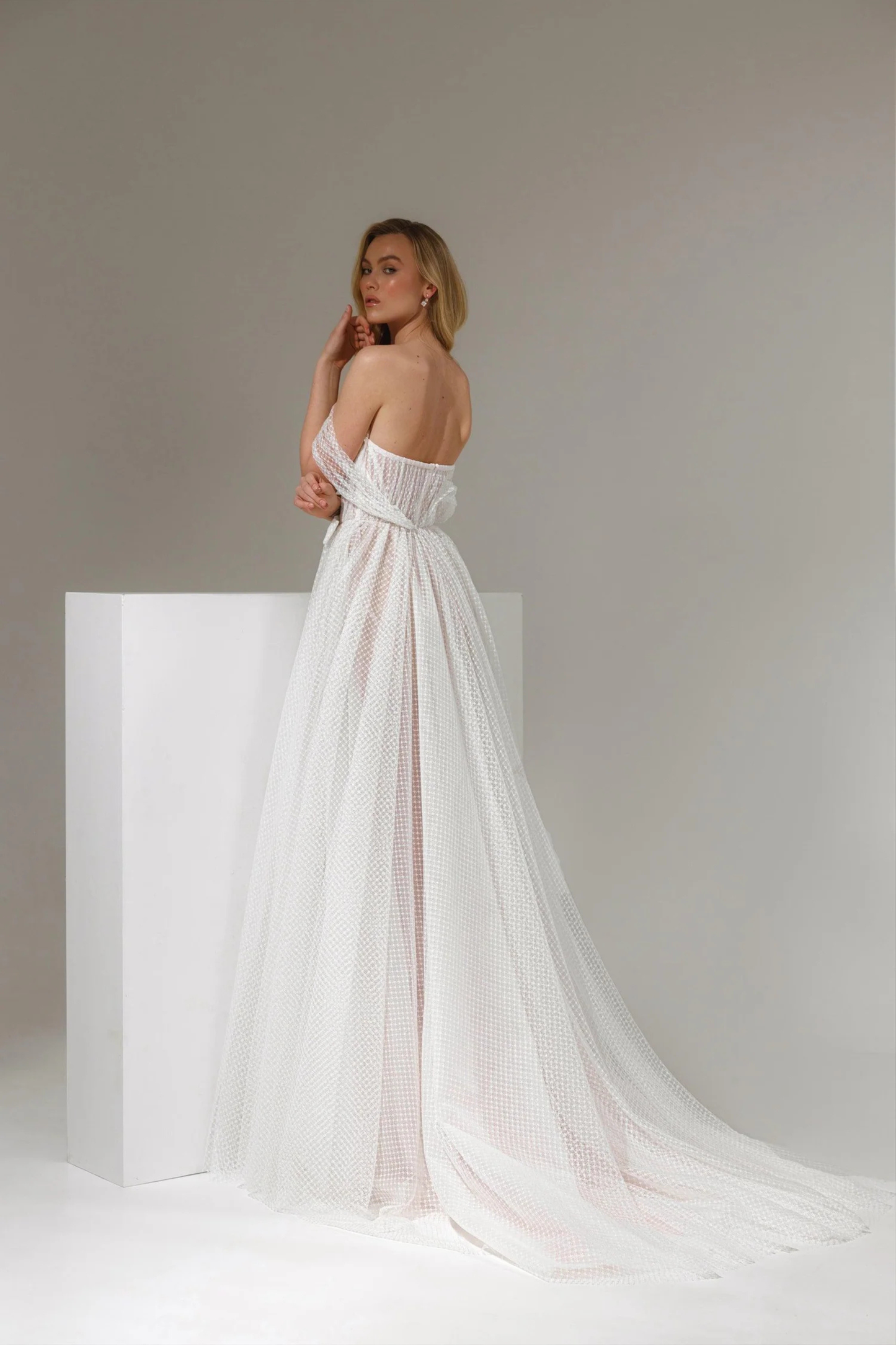 modern romantic wedding dress with bow
