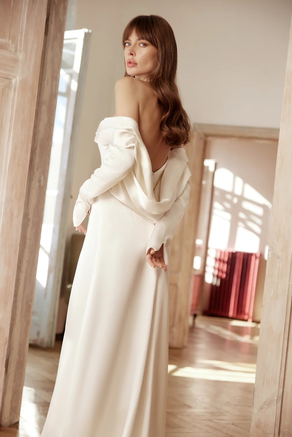 A-line wedding dress with flowing silhouette and natural silk texture