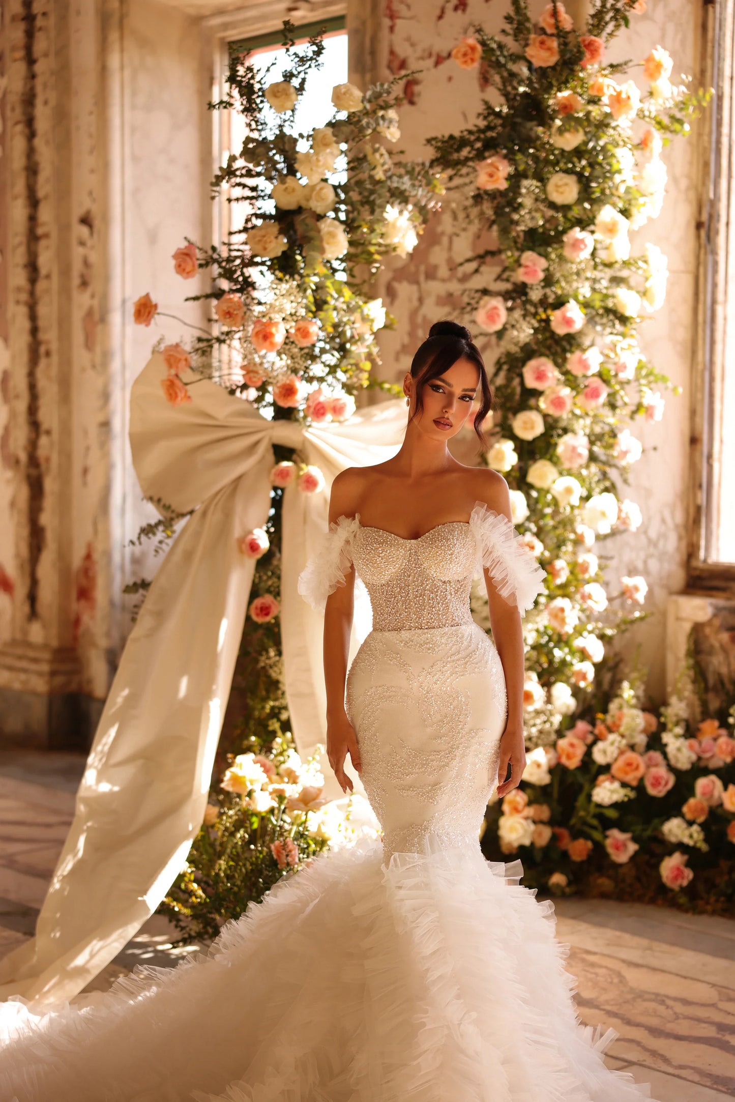 Elegant wedding dress with shimmer detail and dramatic train