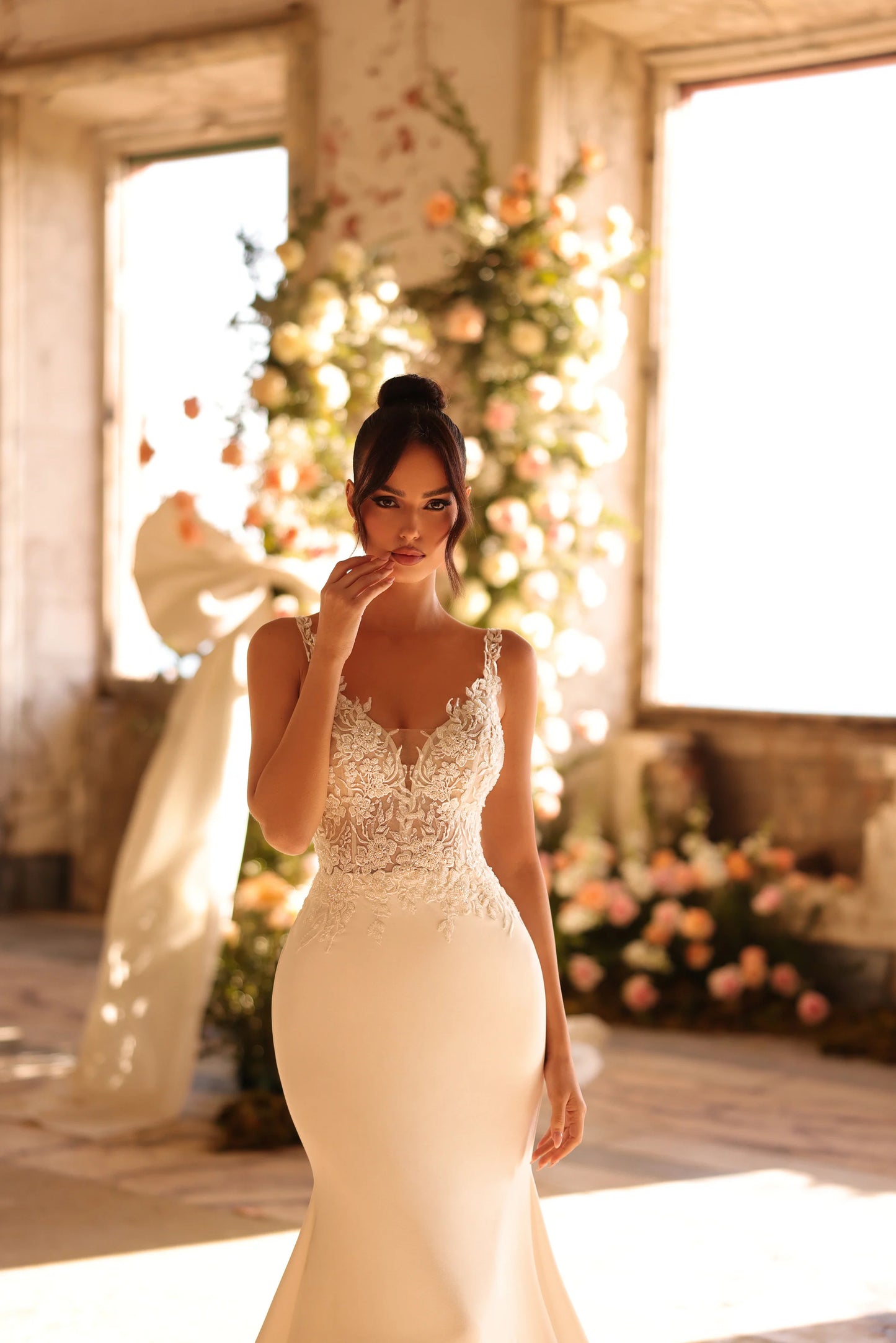 Elegant wedding dress with illusion back and soft romantic lines