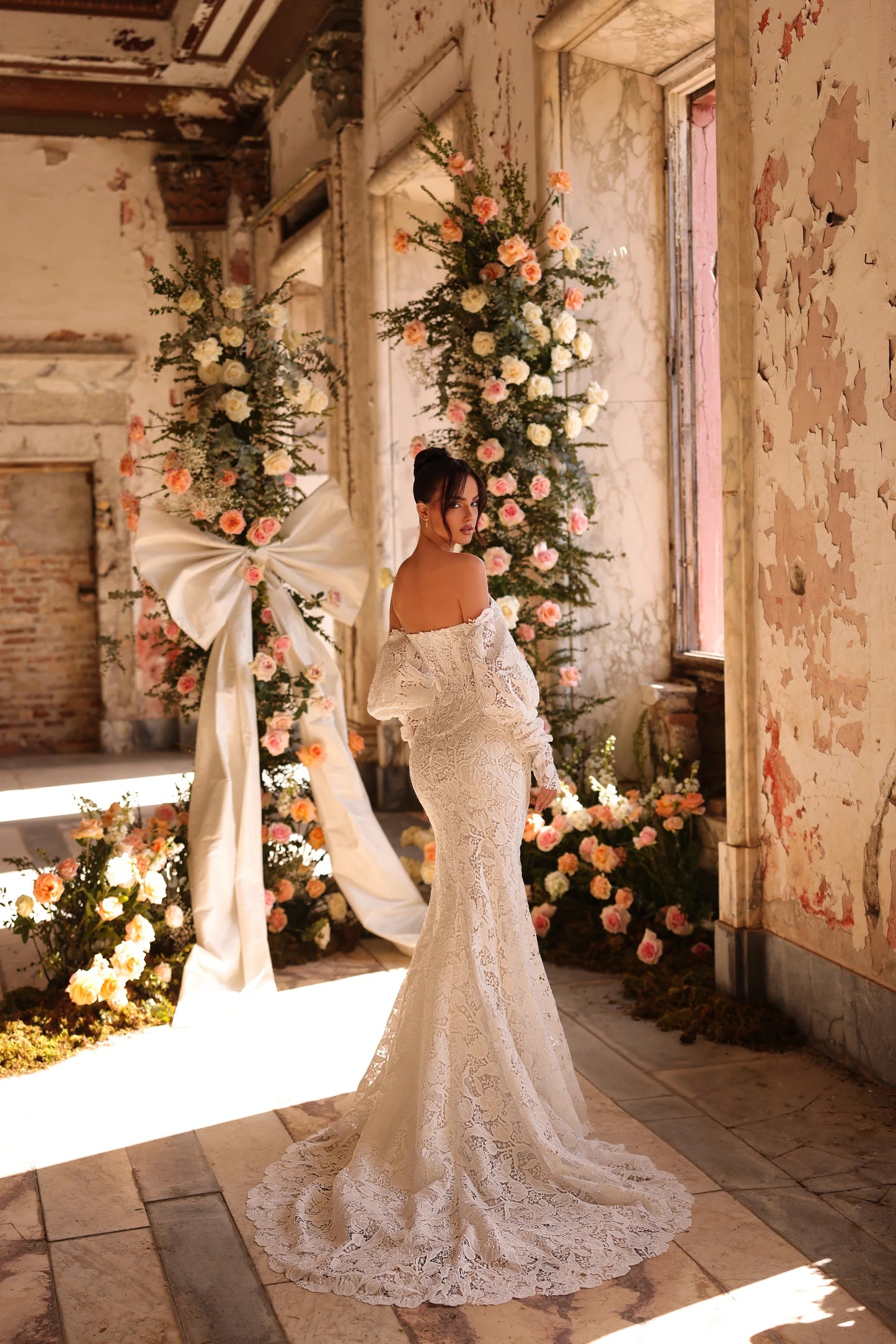 Classic lace gown with bold twist and soft flowing train