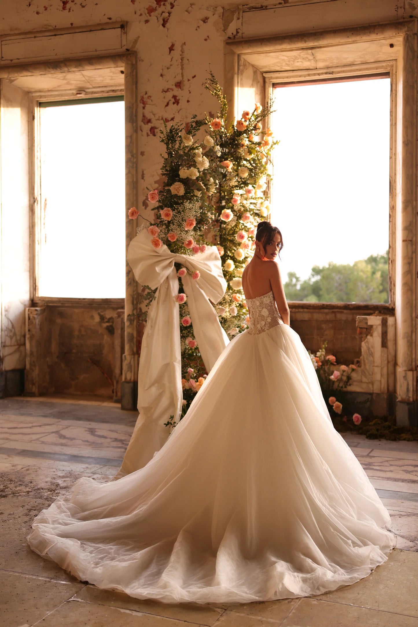 Romantic wedding dress with dreamy layered skirt and fairytale silhouette