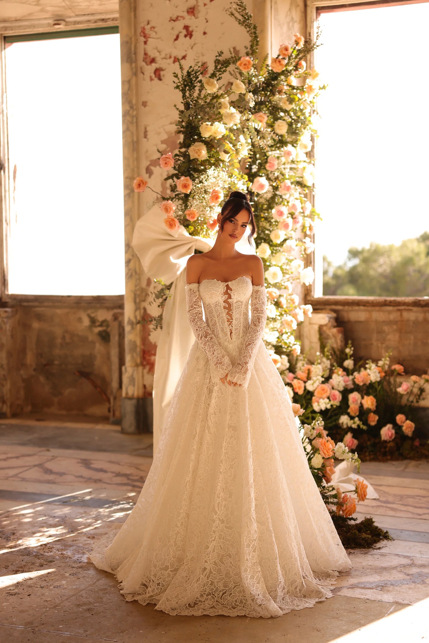 Bride in off-shoulder A-line wedding dress with illusion lace bodice