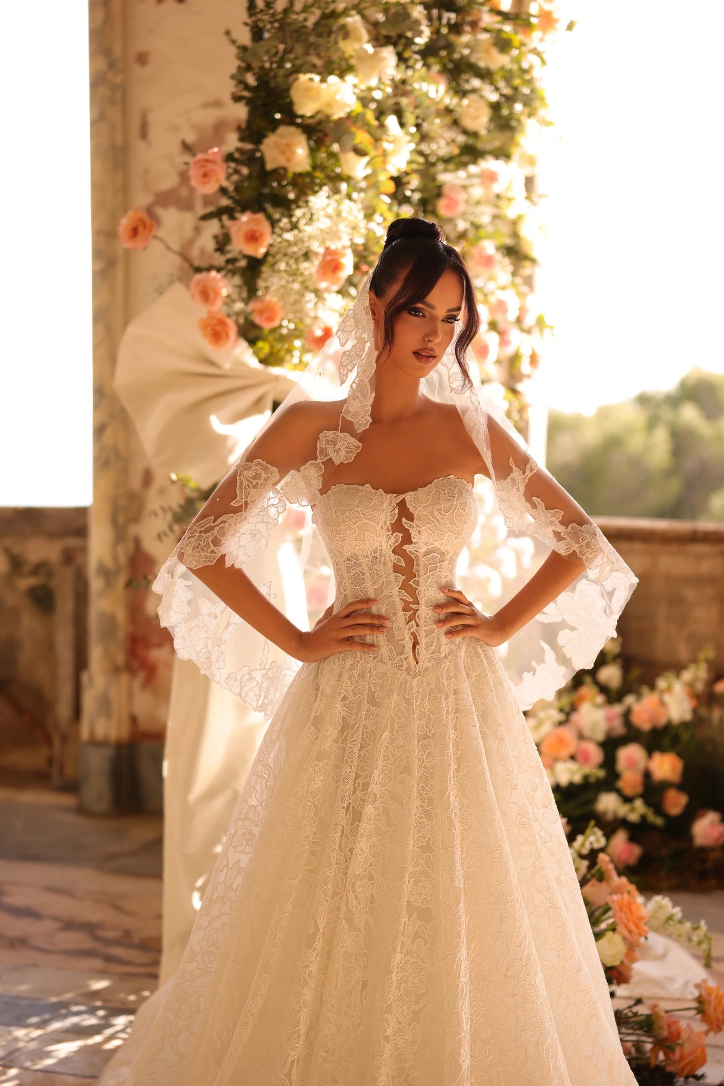 Elegant lace bridal dress with soft tulle and royal-inspired details