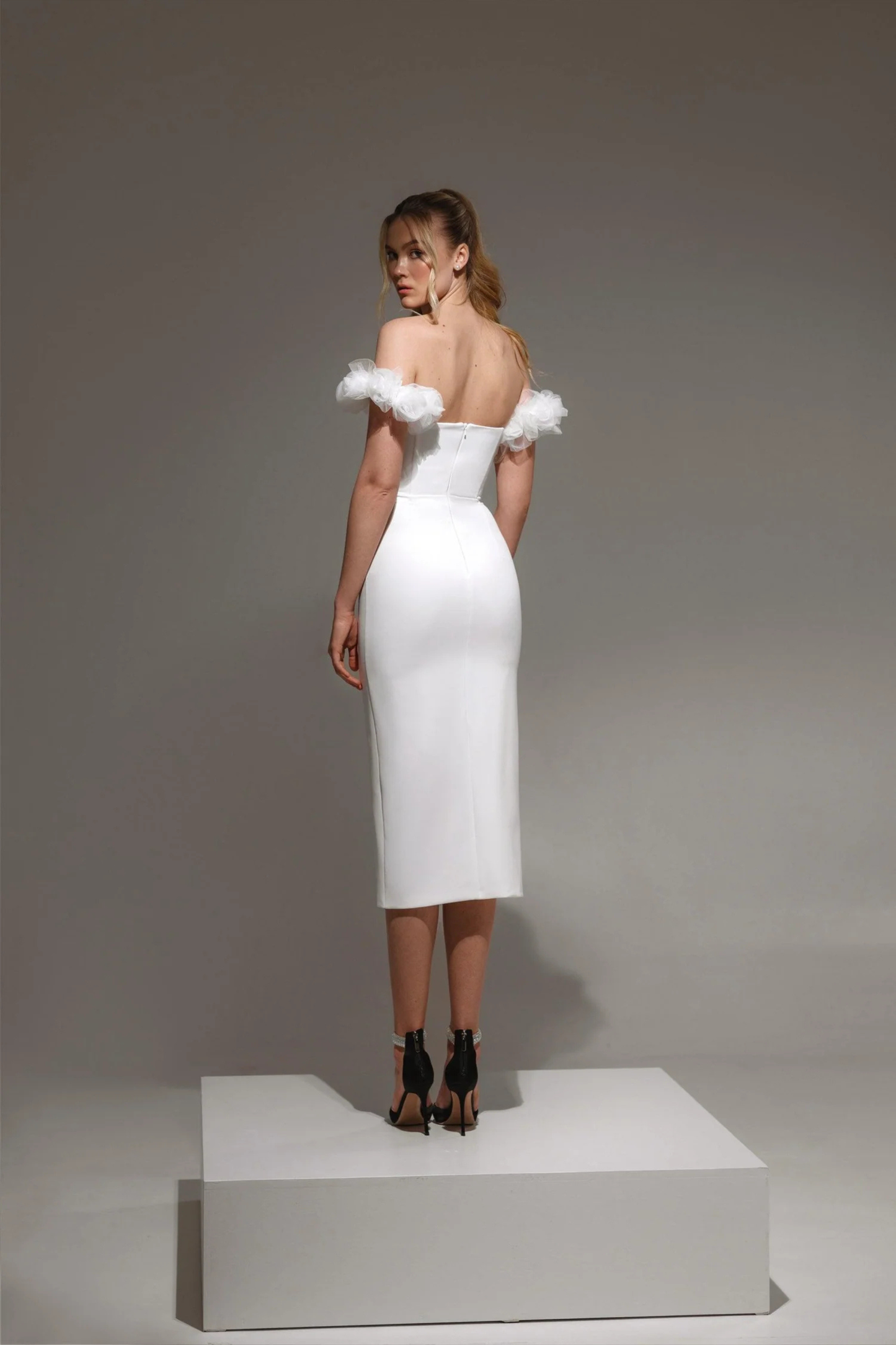 Fitted midi wedding dress with button detailing