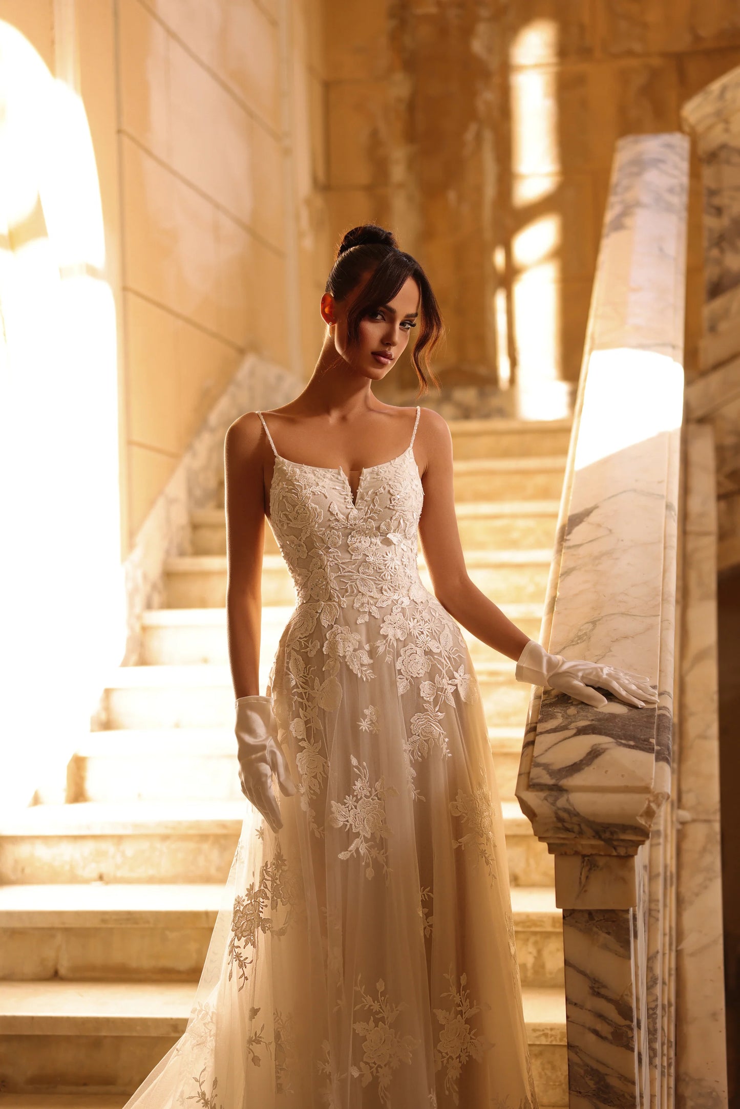 Close-up of sheer lace bodice with delicate floral detailing.