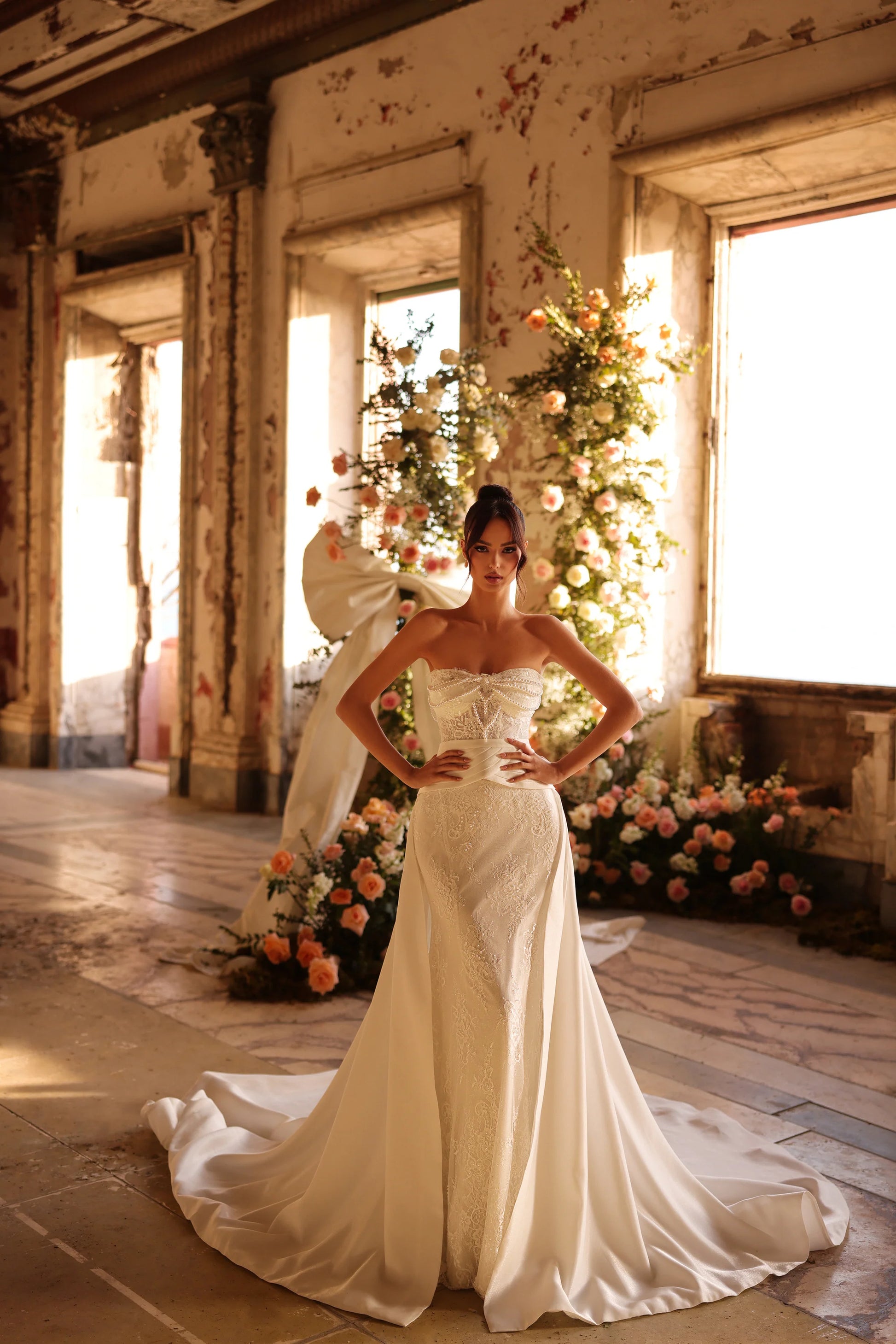 Bride in modern romantic gown with lace touches and draped bodice