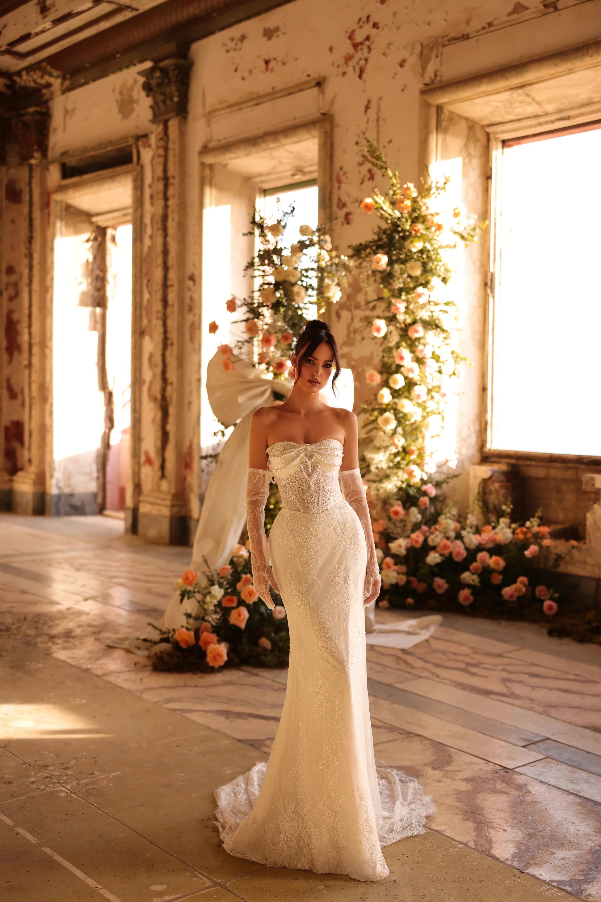 Flowing cathedral train cascading behind elegant bridal silhouette