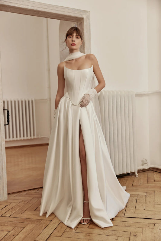 Bride in a structured A-line wedding gown with soft tulle skirt