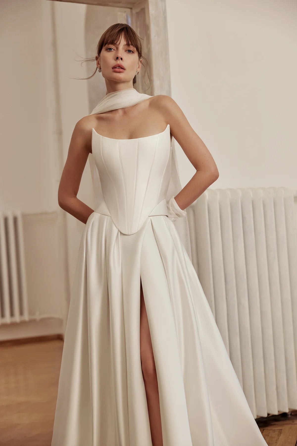 Bride wearing fitted bodice with subtle shimmer