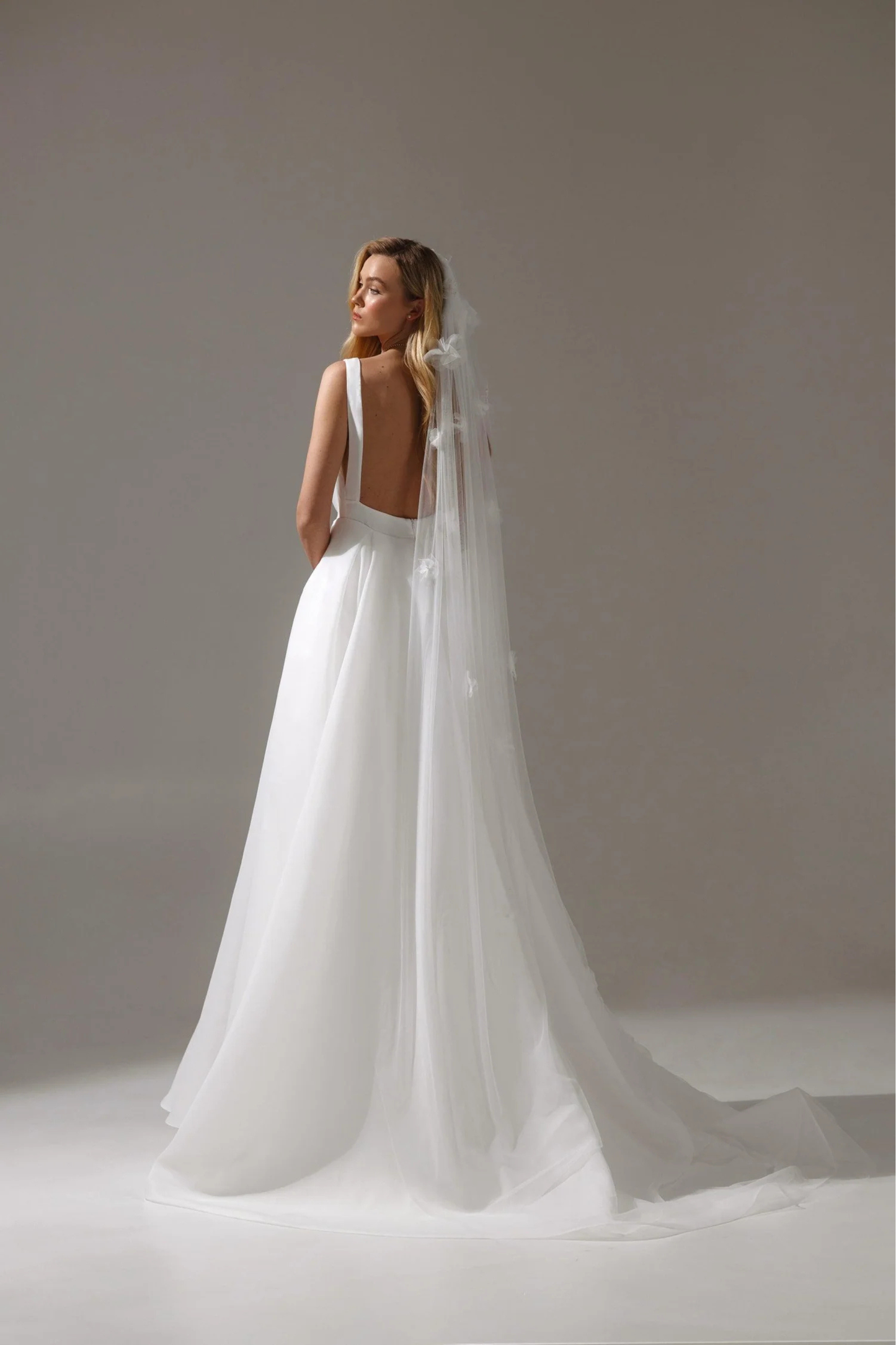 Ivory bridal dress for ceremony and reception