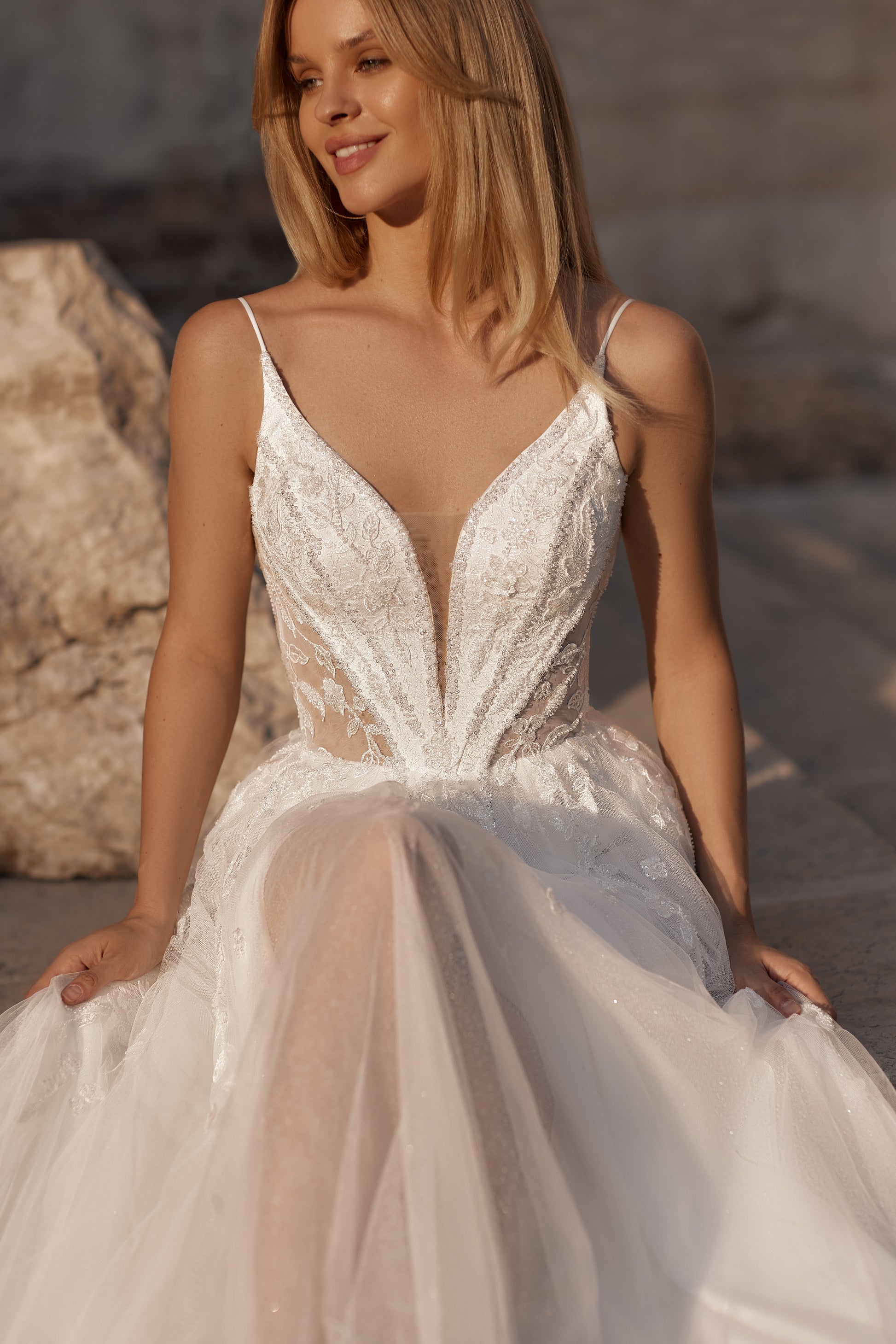Close-up of floral embroidered bodice with sheer elements