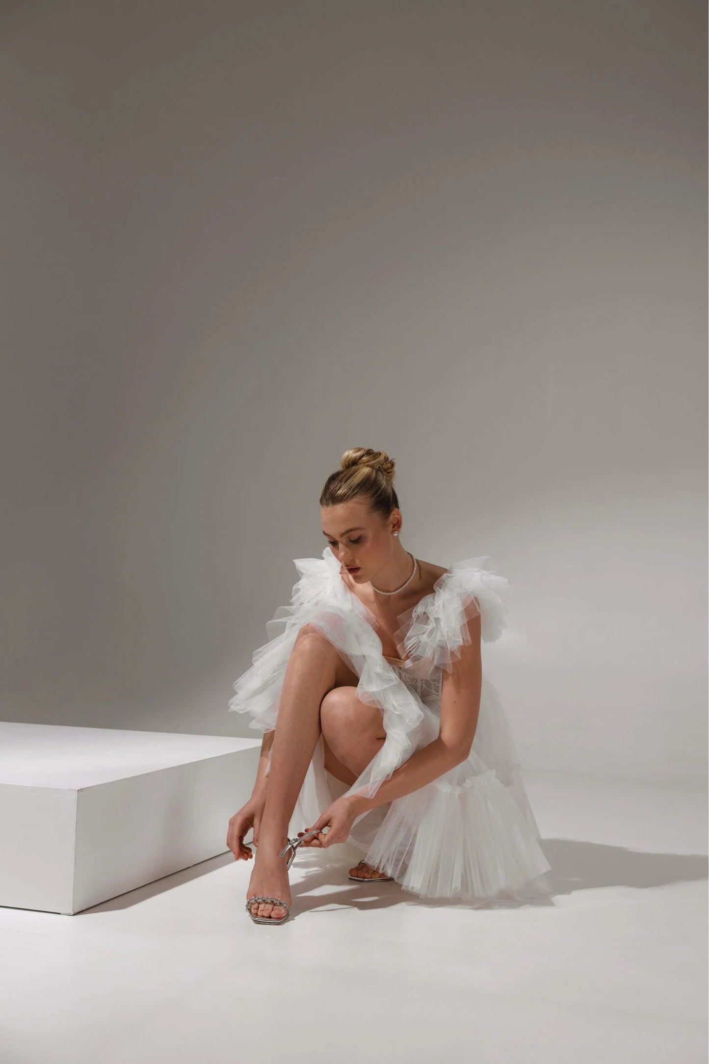 Modern mini wedding dress with deep V neckline