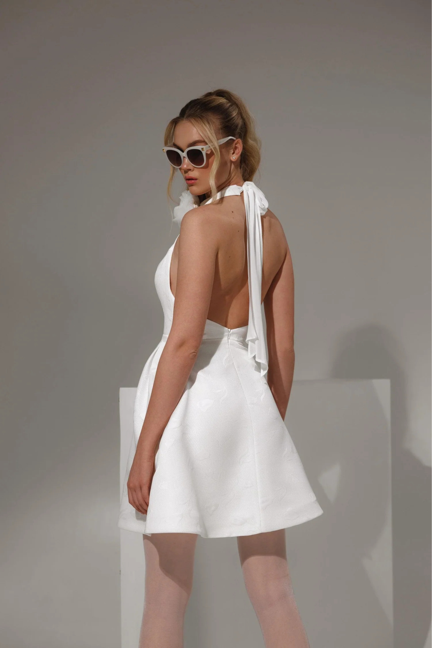Modern bridal dress with deep plunge and structured bodice