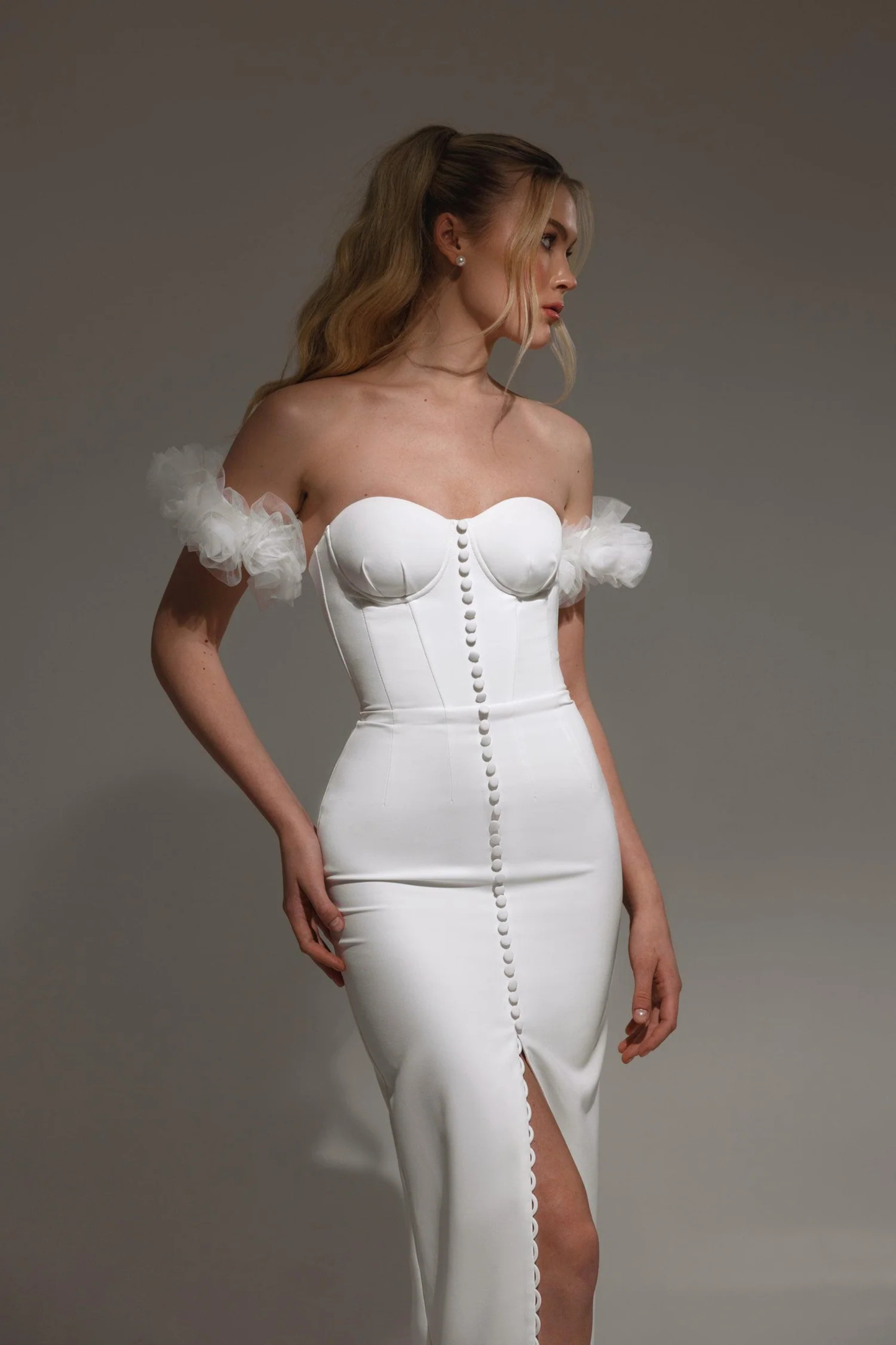 Sheath wedding dress with corset bodice and front slit
