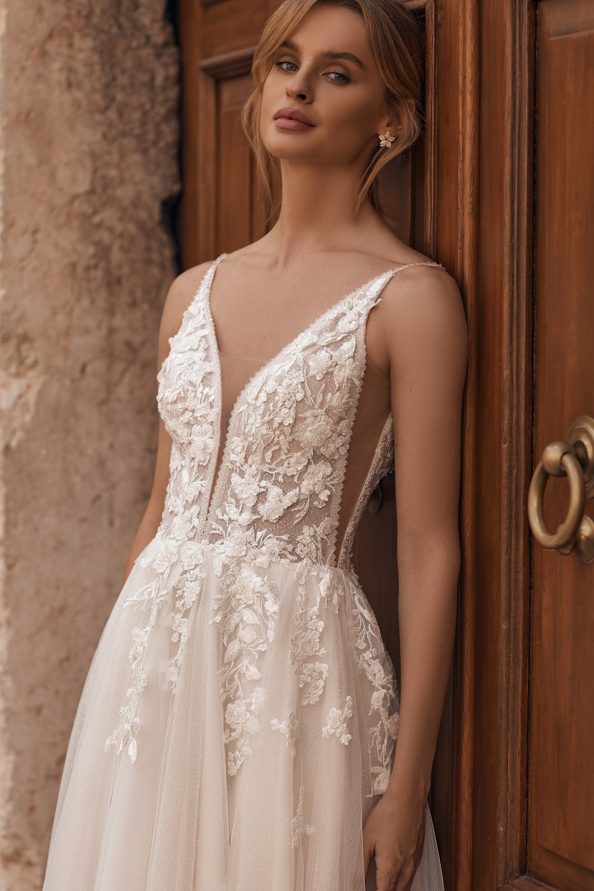 Detailed lace bodice with transparent side inserts and delicate straps