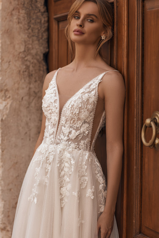 Detailed lace bodice with transparent side inserts and delicate straps