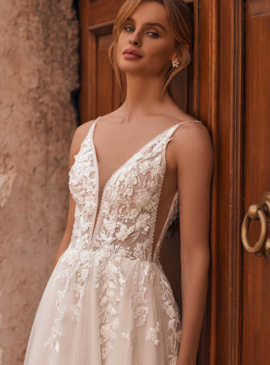 Detailed lace bodice with transparent side inserts and delicate straps