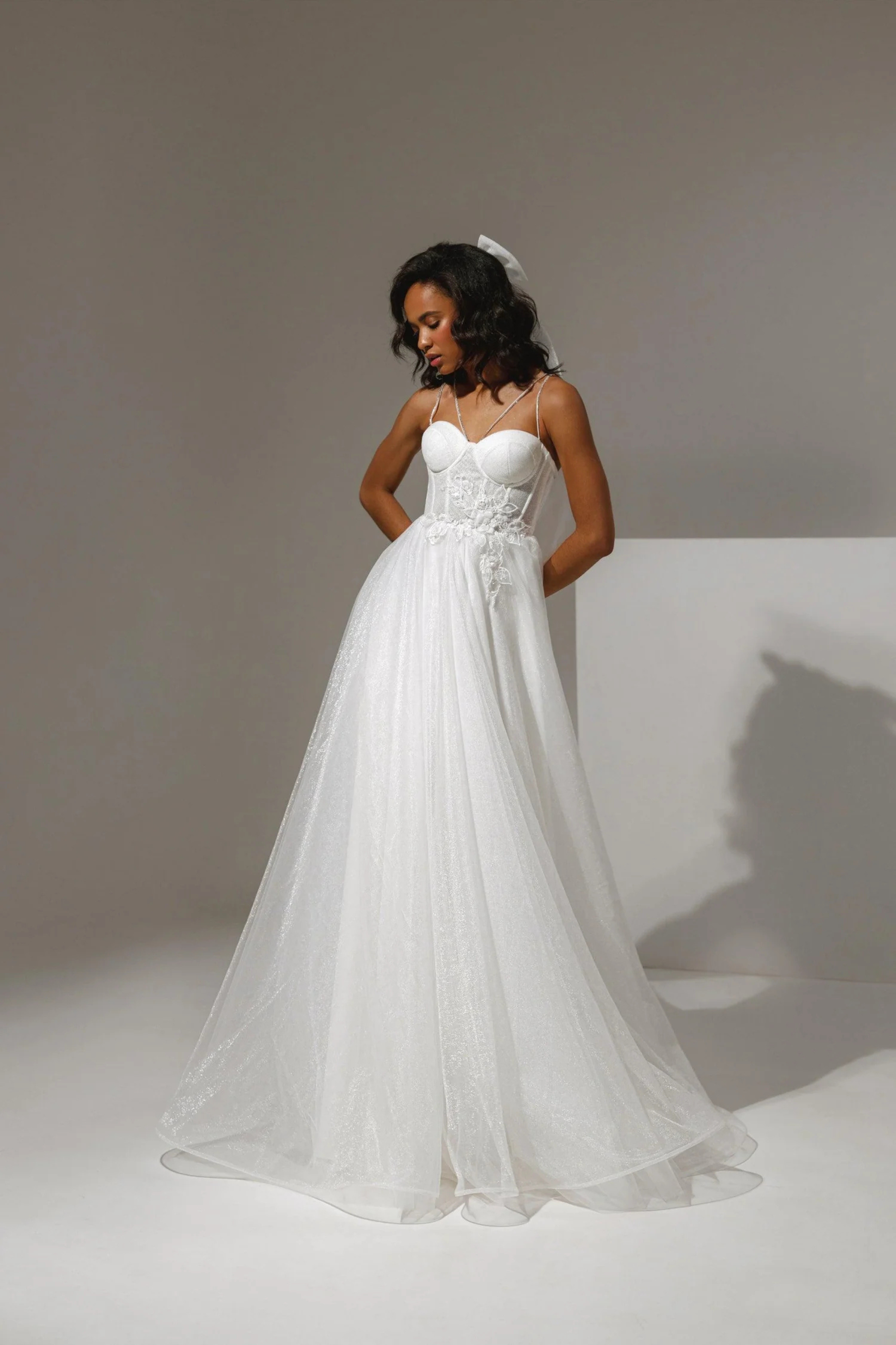 A-line wedding dress with corset bodice and flowing tulle skirt