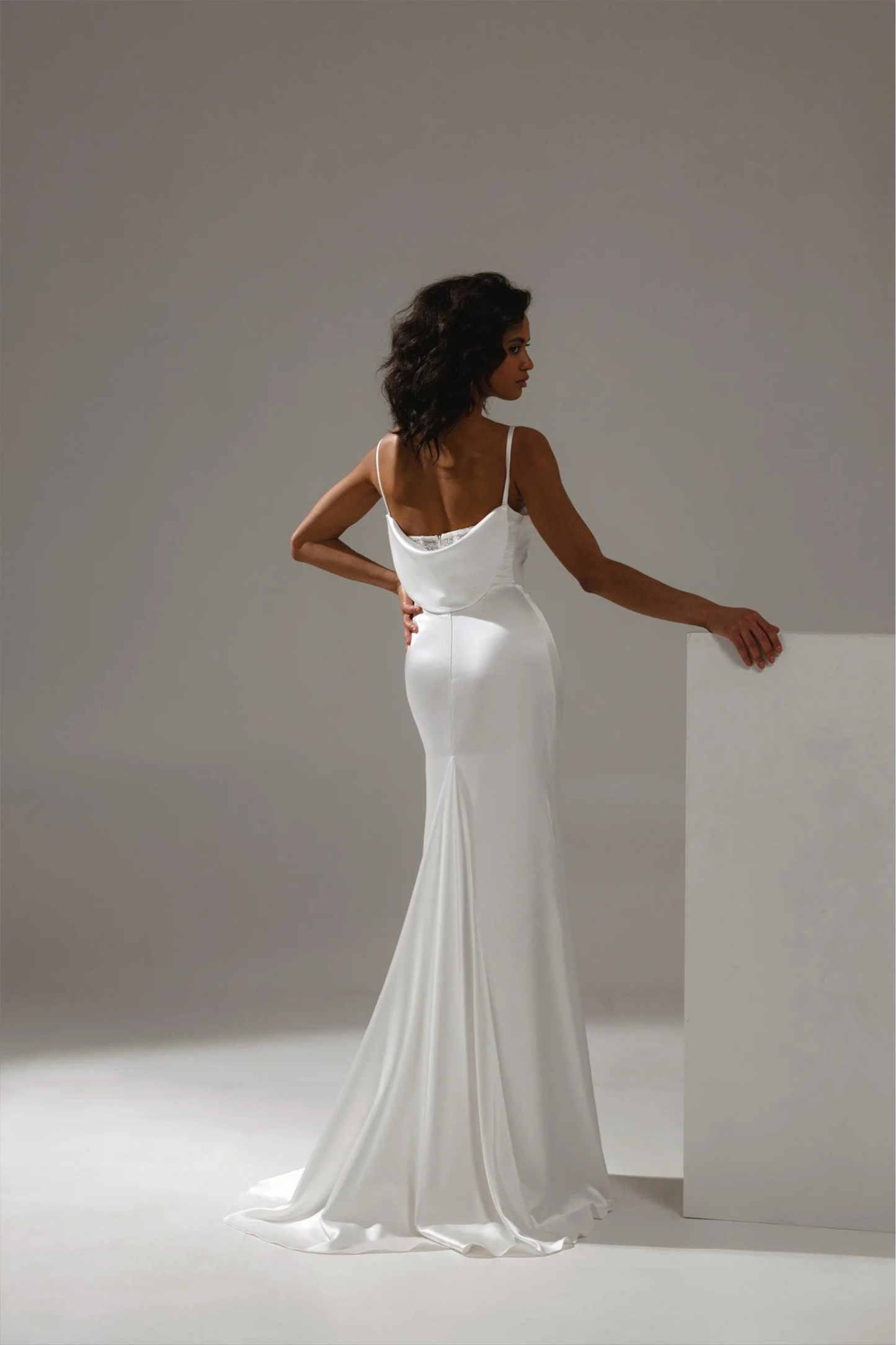 Elegant minimalist bridal gown with clean lines and smooth fabric